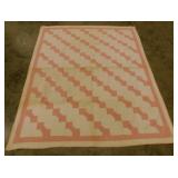 Antique hand stitched bowtie quilt