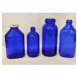 4 vintage cobalt glass medicine bottles, tallest