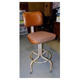 Vintage industrial shop chair on casters