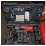 Ridgid Press tool w/ jaws & battery charger -