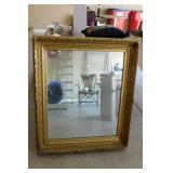 Wall mirror in carved wood frame, 33" x 38"