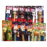 36 different PEZ candy dispensers on cards: