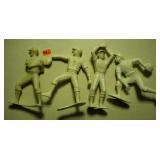 4 baseball figures