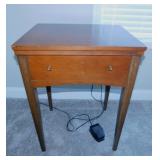 1969 Sears Kenmore sewing machine in table with