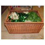 Woven rattan trunk full of new Christmas garland,