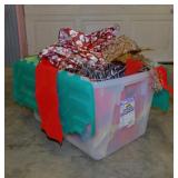 Flip-top 15 gallon storage tote full of Christmas