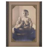 Antique photographs in portrait holders & frames,