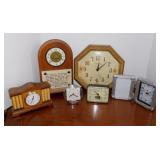 6 clocks including a hand crafted Fisher wooden