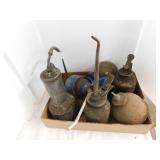 9 vintage oil cans