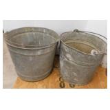 2 galvanized farm water buckets