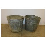 2 galvanized water buckets