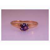 Unmarked yellow gold round amethyst ring, size 7
