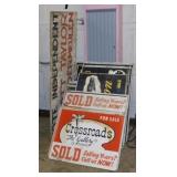 Several realtor signs