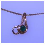 14K yellow gold emerald & diamond pendant on 14K