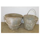 2 metal water buckets