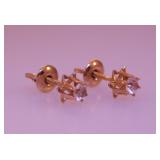 Pair of yellow gold diamond stud pierced earrings