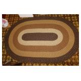 Large braided oval area rug, 8.5' x 5.5'