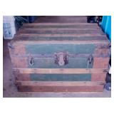 Antique flat top steamer trunk on rollers, 28' x