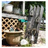 Cast iron wagon wheel - Primitive wood fence -