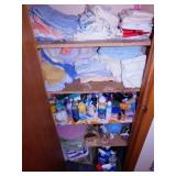Contents of closet: Cleaning supplies - Towels -