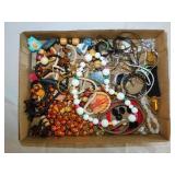 Flat of costume jewelry