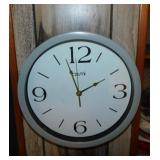 Two Tzumi wall clocks