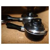 2 T-Fal non-stick pans w/ stainless lids