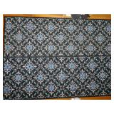 2 matching area rugs in shades of blue
