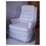 Lovely ivory upholstered swivel rocking chair,