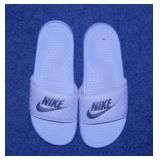 Like new ladies Nike slip-on slides, size 8