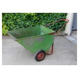 Vintage metal wheelbarrow w/ three plastic