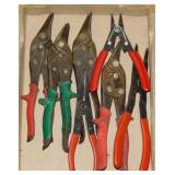 Tin snips and snap ring pliers