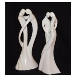 Two 2005 Enesco Circle of Love porcelain statues: