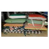 Several patio chair cushions & 2 boat flotation