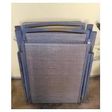 Pair of metal framed folding lounge chairs w/