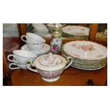 Vintage porcelain rose pattern plates -