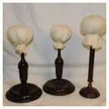 3 wooden hat stands