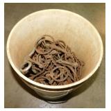 Bucket full of antique horse bits