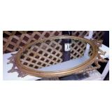 Oval framed mirror, some damage, 25" x 38"