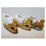 Ceramic horse-drawn wagon planters -