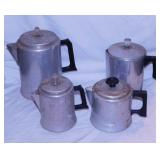 4 vintage aluminum coffee percolators, tallest is