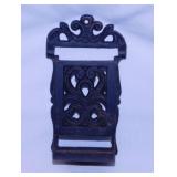 Vintage cast iron wall mounted match holder with