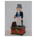 Vintage cast iron mechanical Uncle Sam coin bank,