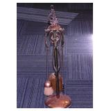 Set of copper fireplace tools in stand -