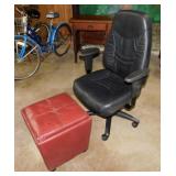 Executive office chair on casters -