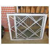 2 antique window panes w/ wood frames, largest is
