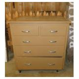 Vintage wooden 5 drawer chest on casters,
