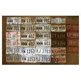 28 embossed metal Illinois license plates: 1960