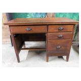 Antique oak desk w/ metal pulls & 4 drawers, 42"