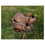 Vintage tooled leather youth saddle, 12.5" seat,